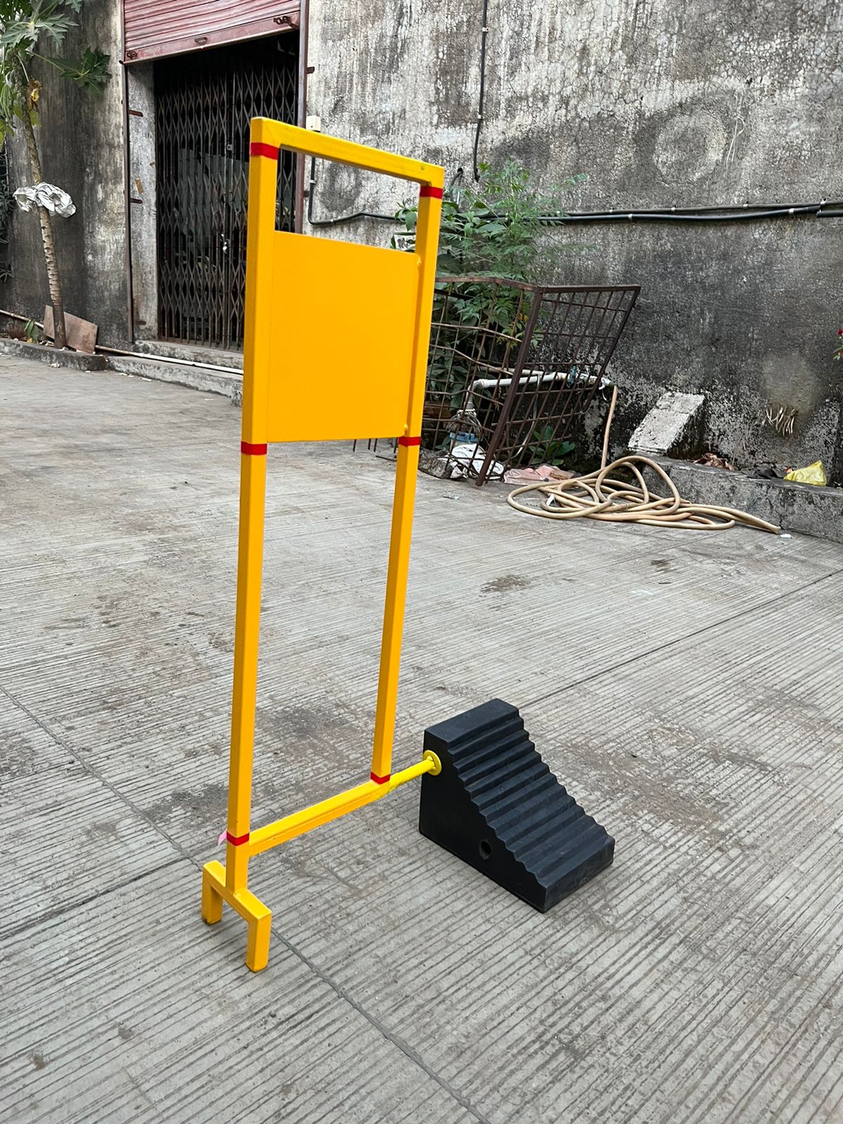 Truck wheel chock with metal stand